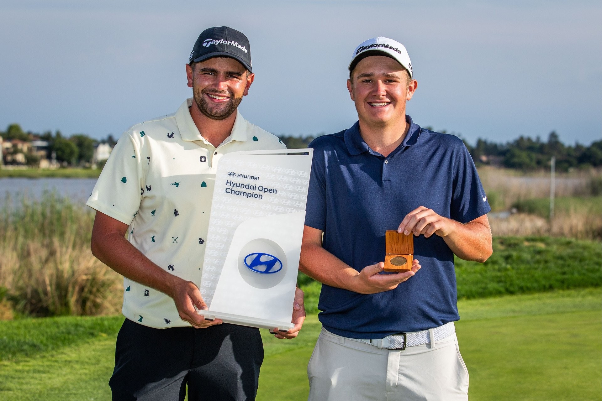 Casey Jarvis and his caddie, Conrad Loubser, who received a Sunshine Tour medallion
for the winning caddie. (Photo by Tyrone Winfield/Sunshine Tour)

